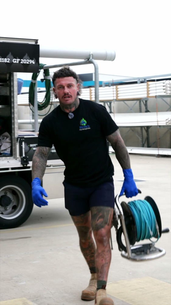 Plumber heading to a job with the jetter