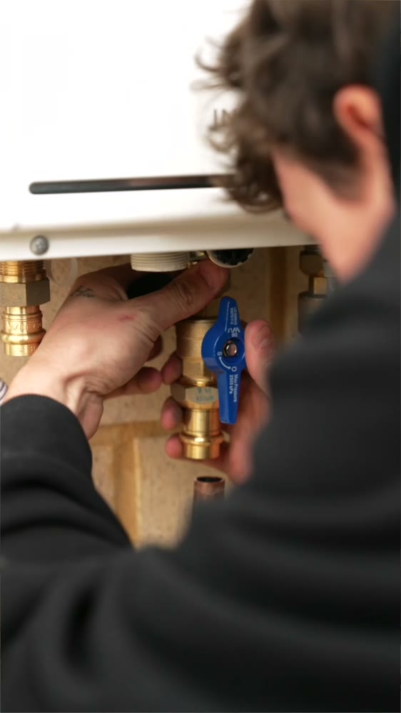 Valve and drain pipe repair under a sink