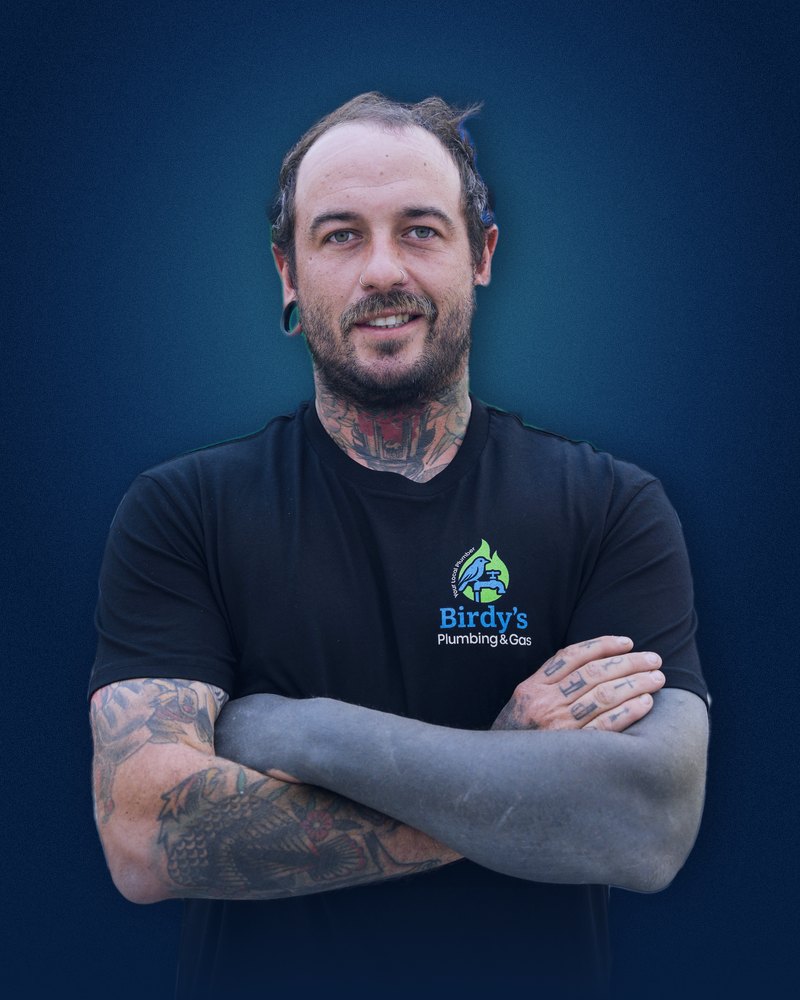 Birdy's evaporative cooling technician smiling, arms crossed