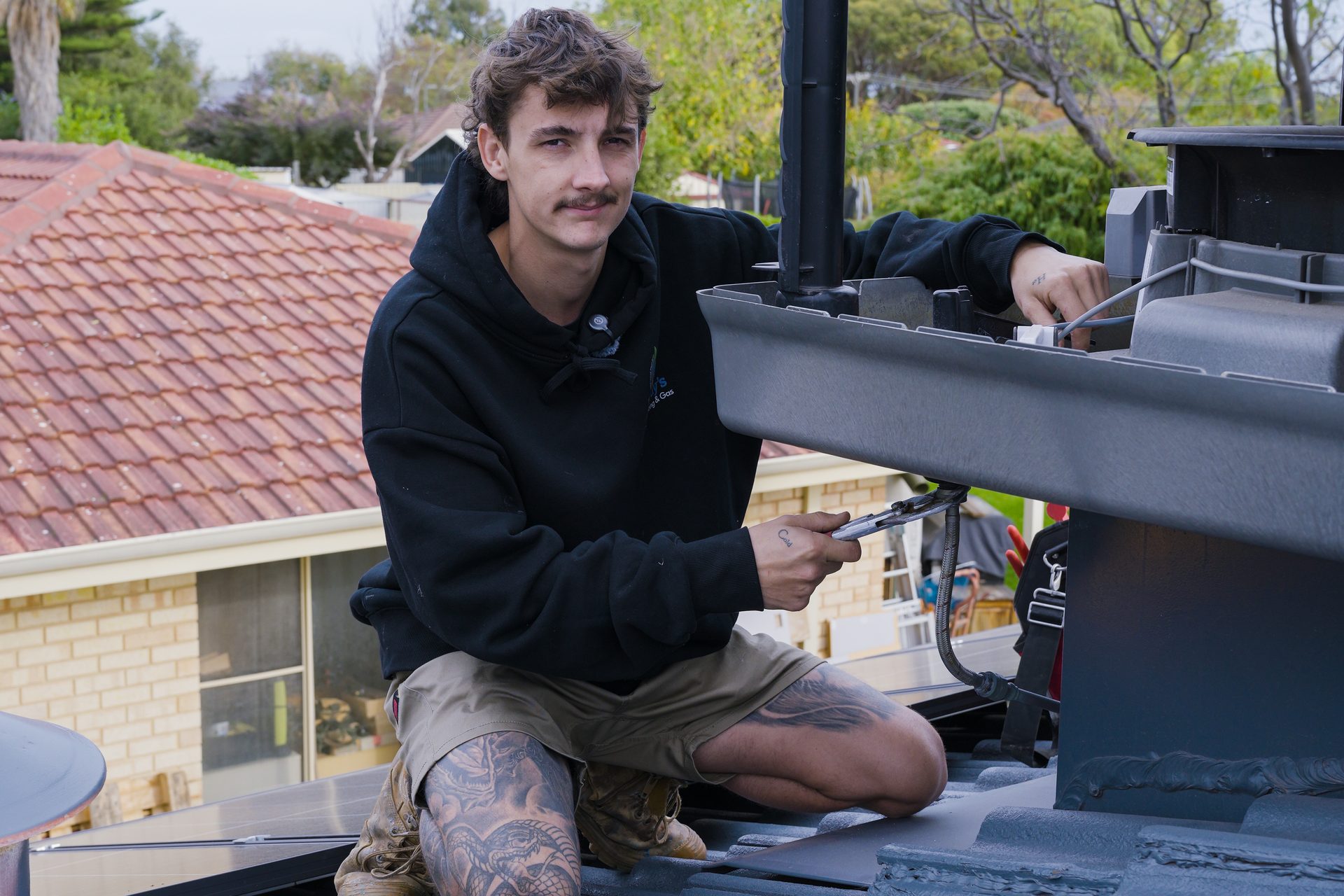 Birdy's technician servicing a rooftop evaporative cooler